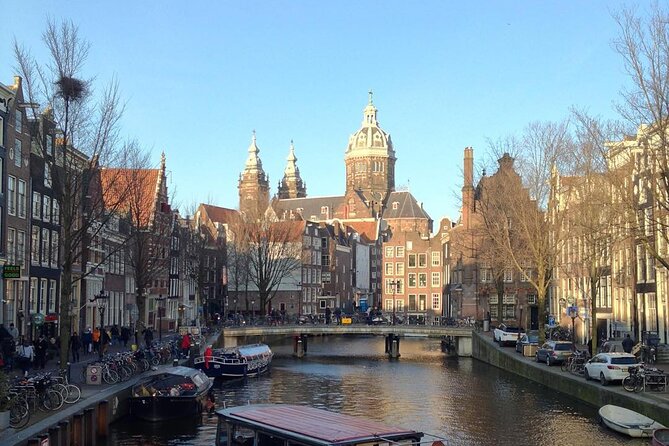 Amsterdam Sightseeing Tour + Hidden Gems + Tastings + PDF guide - Flowers, money, and the Bloemenmarkt