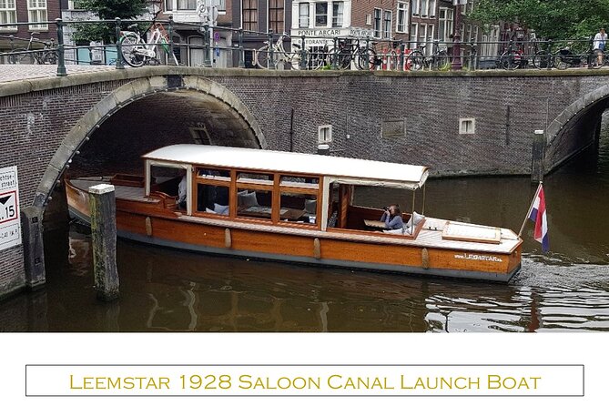 Amsterdam small-group canal cruise in 1920s saloon boat - A guided ride rather than a silent sightseeing loop