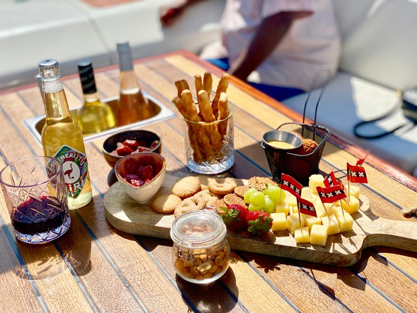 Amsterdam Small Group Canal Cruise inc Snacks/Drinks Winter - The opening stretch: bridges, canal houses, and local stories