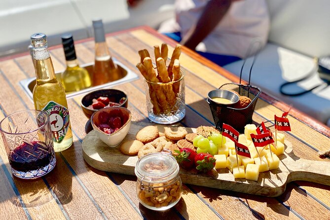 Amsterdam Small-Group Canal Cruise Including Snacks and Drinks - Bitterballen, stroopwafels, and the open bar