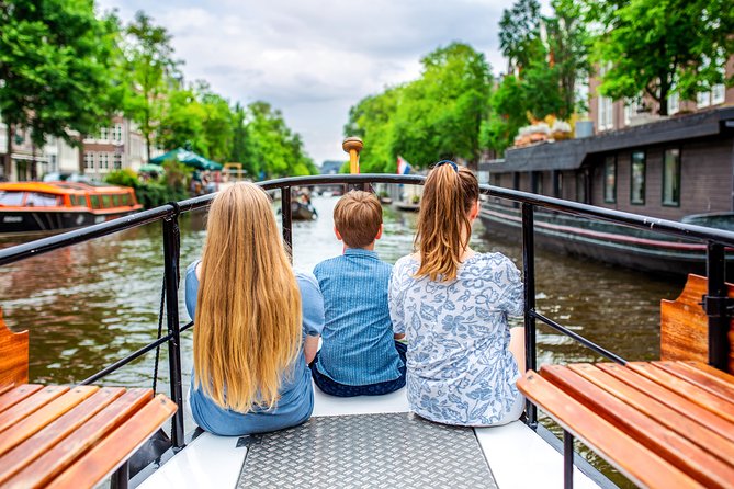 Amsterdam Small-Group Canal Cruise With Dutch Snacks and Drink - Local snacks, Dutch drinks, and the hot-food stop
