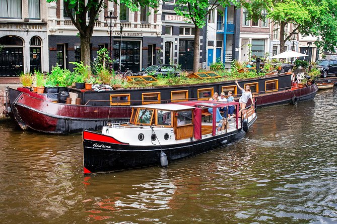 Amsterdam Small-Group Canal Cruise With Dutch Snacks and Drink - The Homomonument and Amsterdam’s wider story