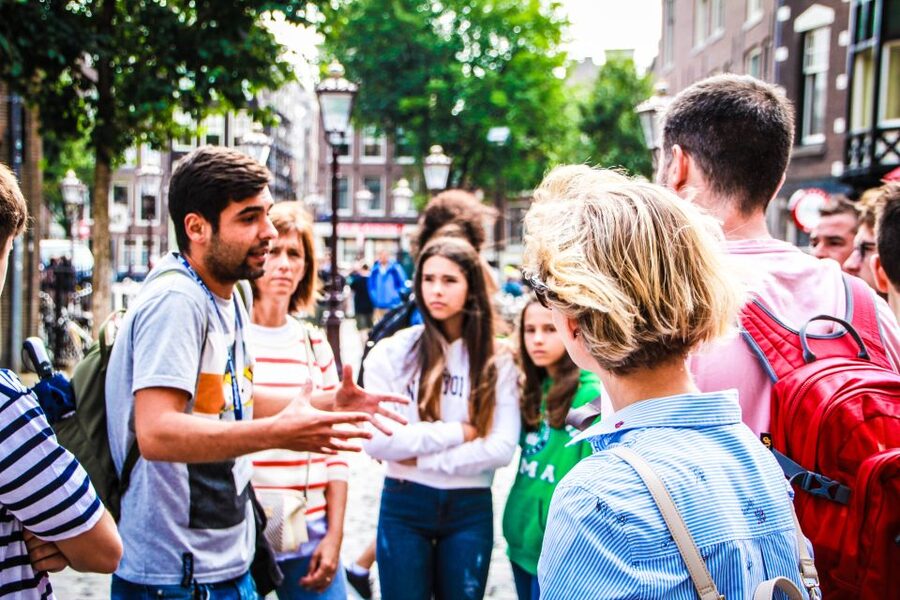 Amsterdam Small-Group Walking Tour - Walking comfort, weather, and group size
