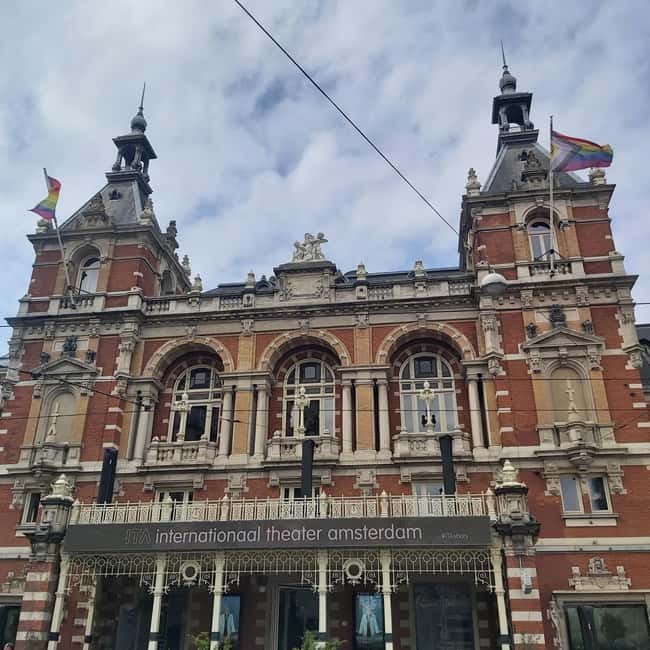Amsterdam: Spanish Tour Unmasking the Redlight District - Starting outside Barbizon Palace Hotel