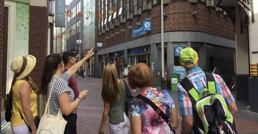 Amsterdam: The Story of History & Culture Walking Tour - Western canals and changing neighborhoods
