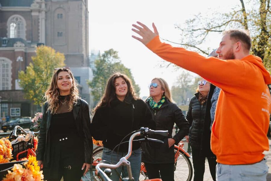Amsterdam: Top Highlights Guided Bike Tour EN/DE/ES/FR/IT/CN - Why a bike is the right way to see Amsterdam