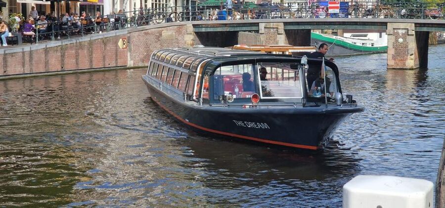 Amsterdam: Traditional Canal Cruise with Bar on Board - A warm start on Amsterdam’s waterways