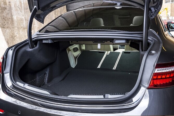 Amsterdam Train Station Arrival Private Transfer to Amsterdam City in Business Car - Timing, phone details, and small booking choices