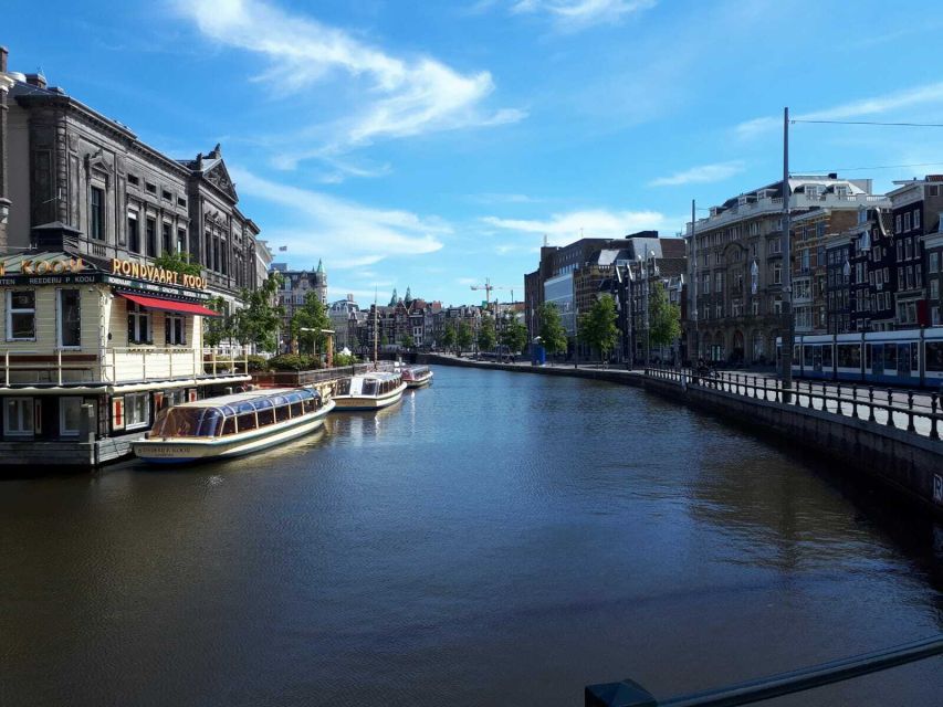 Amsterdam Walking Tour and Canal Cruise - Street markets and everyday Amsterdam