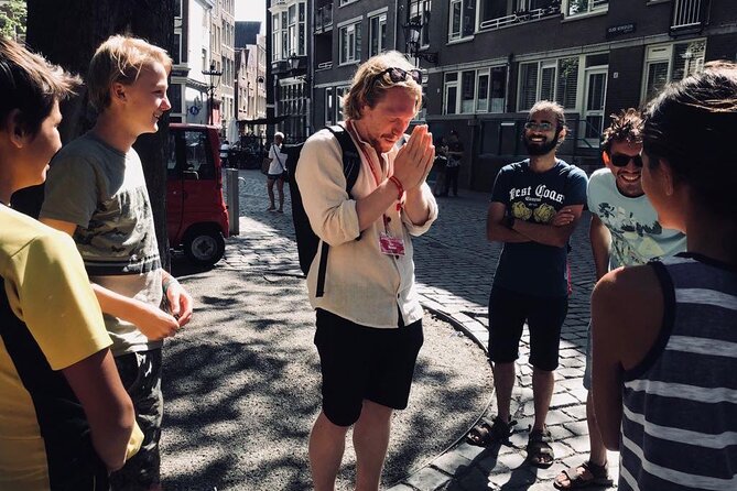 Amsterdam Walking Tour with a local comedian as guide - Timing, group size, and weather