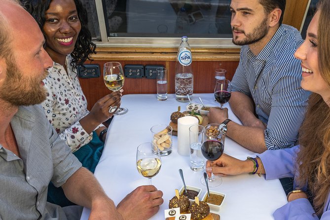 Amsterdam Wine and Cheese Evening Cruise - The best time for lights, sunset, and photographs