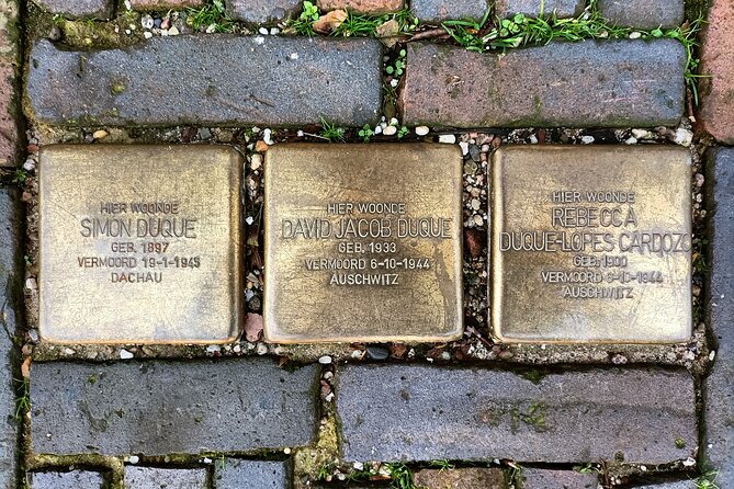 Anne Frank and Amsterdam Jewish History Walking Tour - Dam Square and the meaning of the national memorial