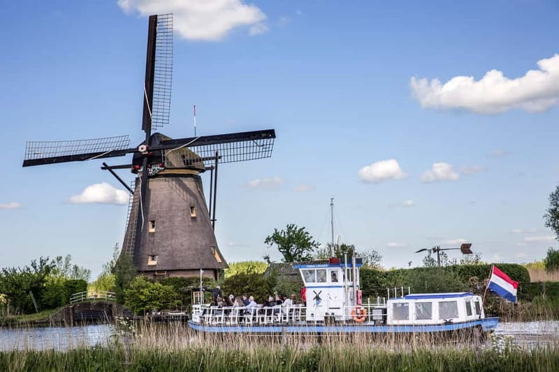 Antwerp: Full-day Holland Guided Keukenhof & Windmills Tour - Clogs and cheese at the Dutch workshop