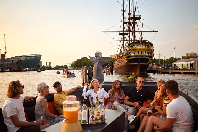 Classic Salonboat Tour in Amsterdam Including Cheese and Wine - Bridges, theaters, and the Amstel