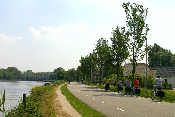 Countryside Bike Tour from Amsterdam: Cheese, Clogs & a Windmill - Cheese, clogs, and the most hands-on stop