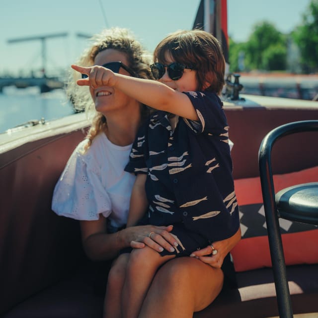 COZY AND FUN CANAL TOUR: A UNIQUE JOURNEY THROUGH AMSTERDAM - NEMO Science Museum and Het Scheepvaartmuseum
