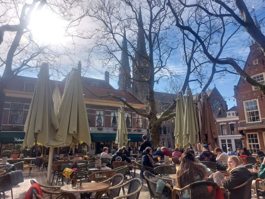 Delft: Dive into the Golden Age on a Private Walking Tour - Walking Through the Old Center and Its Canals