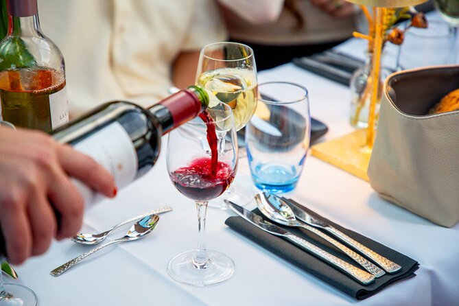 Dinner Canal Cruise Amsterdam: 4-Courses Including Drinks - Crossing the Amstel beneath Magere Brug