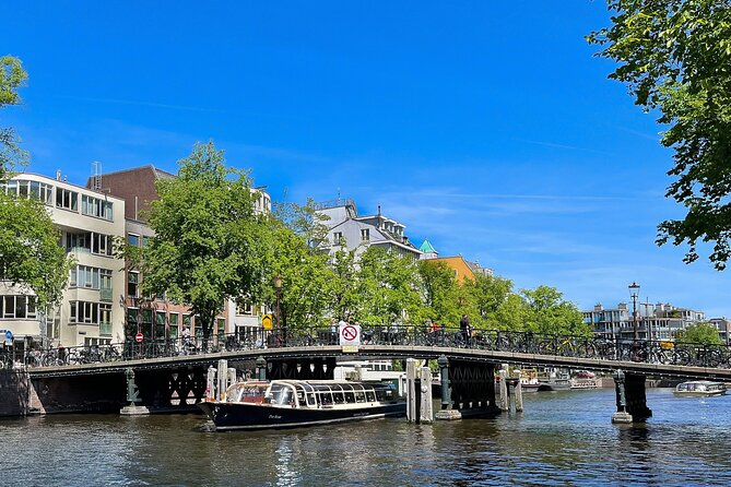Discover Amsterdam: Luxury Canal Cruise with a Local Skipper - Crossing from Central Station to Badhuiskade