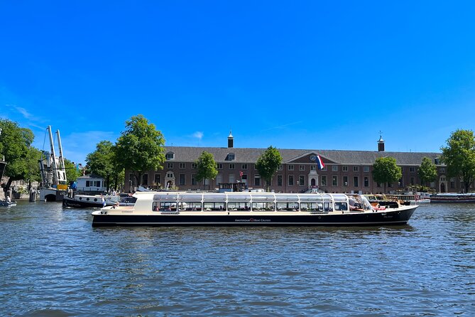 Discover Amsterdam: Luxury Canal Cruise with a Local Skipper - Boat comfort, seating, and group size
