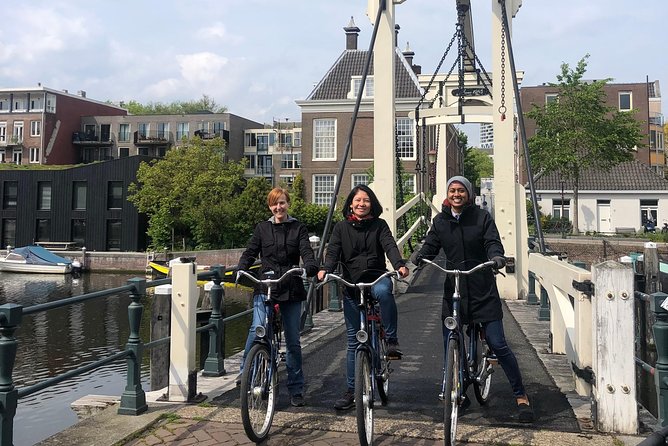 Discover Amsterdam: The Ultimate City Bike Tour - Prinseneiland, Drawbridges, and Amsterdam Central Station