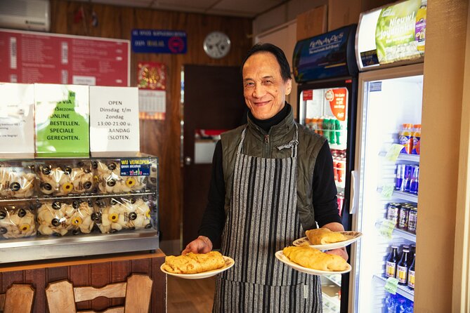 Eating Amsterdam: Albert Cuyp Market & The Pijp Food Tour - Gouda at Johan Kaas in the market