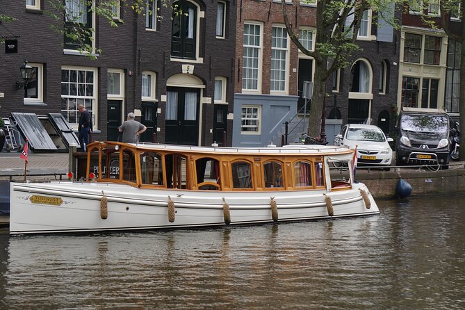 Eating Amsterdam: Food Tour & Canals Cruise - The final hour on a vintage wooden boat