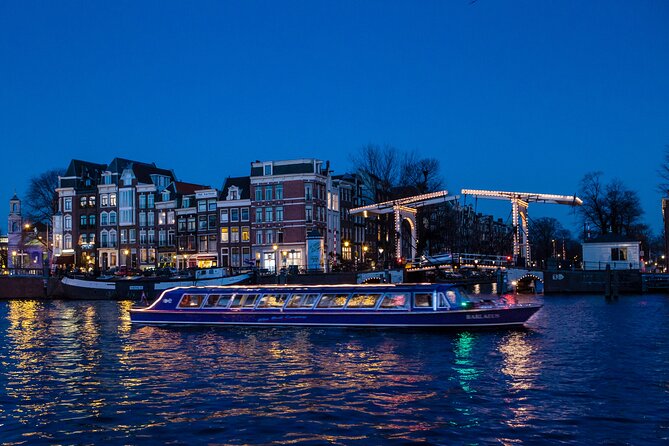 Evening Canal Cruise in Amsterdam with Wine & Cheese Option - The boat, seating, and onboard atmosphere