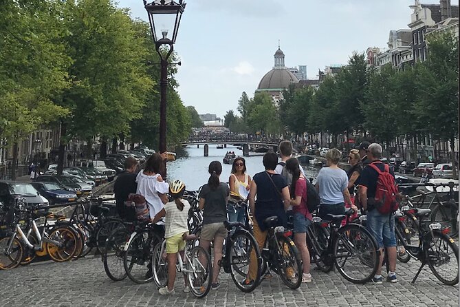 Explore Amsterdam by Bike in the Company of a French Local Guide - Begijnhof, Entrepotdok, and the quieter side of town