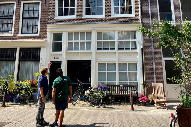Explore hidden streets with friends - Entering the Jordaan through side streets and squares