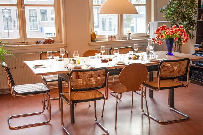 French Bistro-Style Dinner Overlooking Amsterdam's Canals - Wine, conversation, and the small-table format