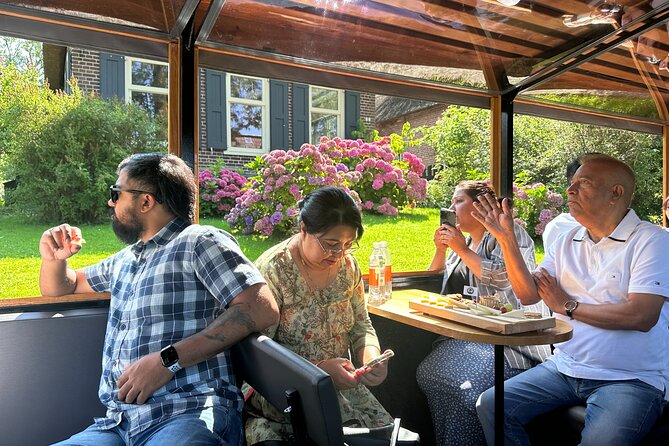 From Amsterdam: Giethoorn Day Trip with Canal & Village Tour - The windmill stop along the route