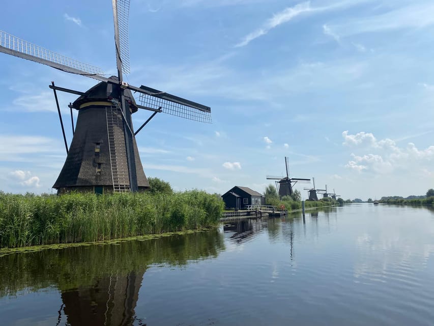 From Amsterdam: Kinderdijk, Delft & Mauritshuis Private Tour - Delft’s old streets and monumental center
