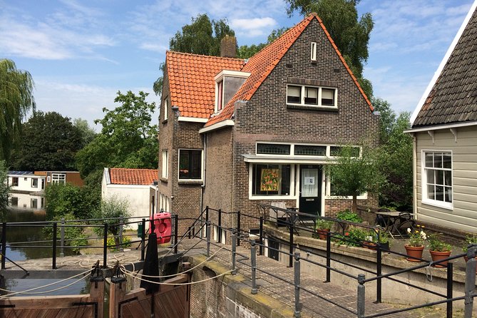 Full-Day Private Guided Countryside Tour from Amsterdam by Bike - Nieuwendammerdijk and Amsterdam’s old wooden houses