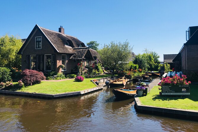 Giethoorn, Afsluitdijk, Zaanse Schans Day Tour Incl Hotel Pick Up - Zaanse Schans: cheese, clogs, and windmills