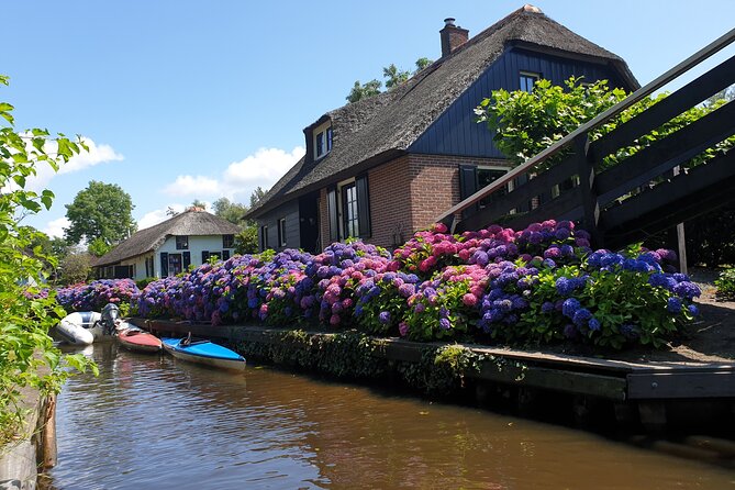 Giethoorn Day Tour from Amsterdam with Small Boat Ride - The one-hour electric boat ride