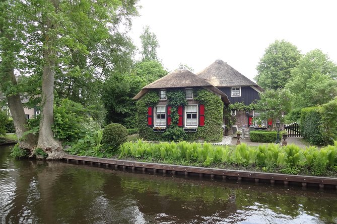 Giethoorn, Zaandam & Zaanse Schans Day Tour w/ Small Boat Ride - The road to Giethoorn crosses Dutch water country