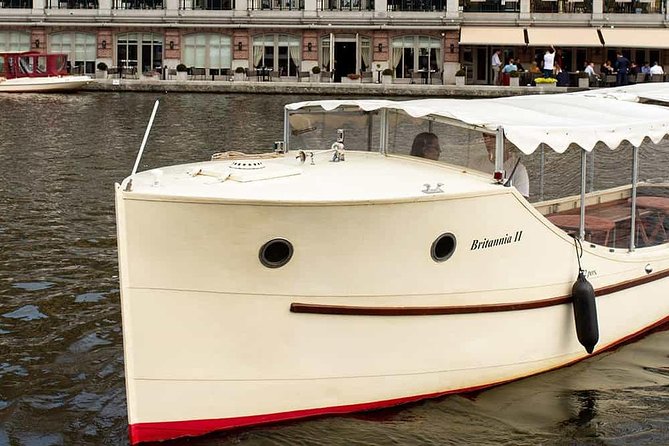 Guided Amsterdam Canal Cruise – Snacks & Drinks on board(1 Hour) - Jewish Quarter, Botanical Gardens, and Canal Stories