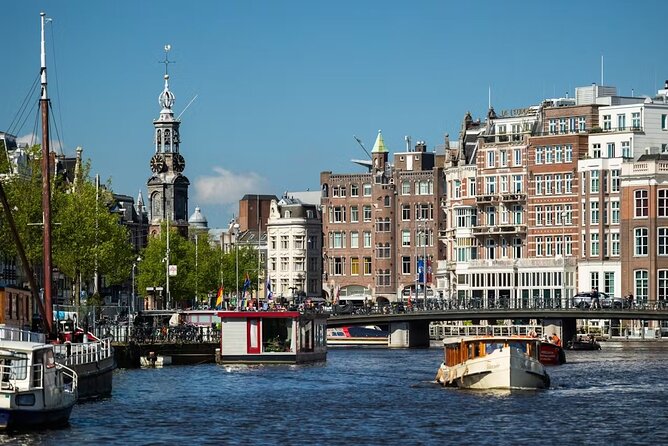 Highlights and Local Insights Canal Cruise Tour in Amsterdam - The Red Light District and Oude Kerk