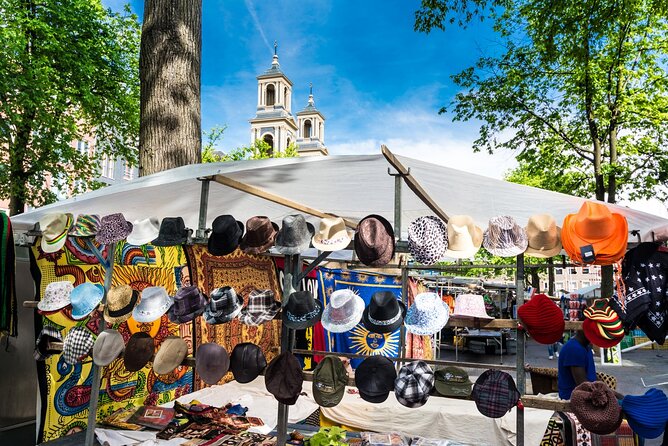 Historic Amsterdam Walking Tour: Royal Palace & Flea Markets - Following the Amstel for twenty minutes
