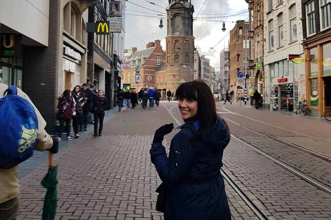 Historic Amsterdam Walking Tour: Royal Palace & Flea Markets - Dam Square brings the story together