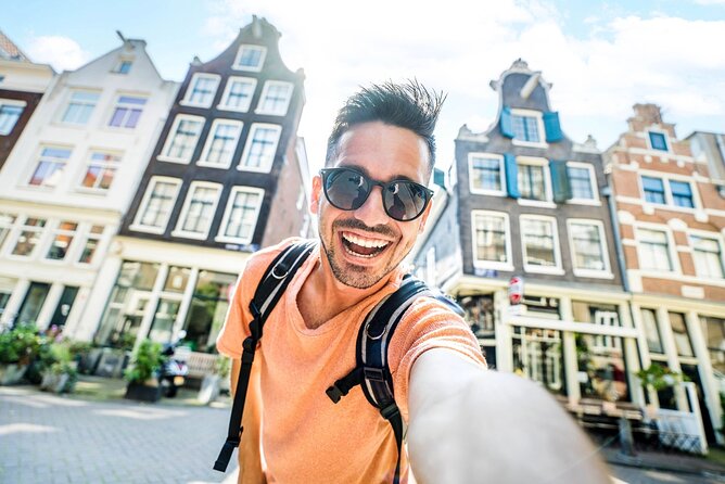 Historic Amsterdam Walking Tour: Royal Palace & Flea Markets - The Waag and Amsterdam’s old city gate