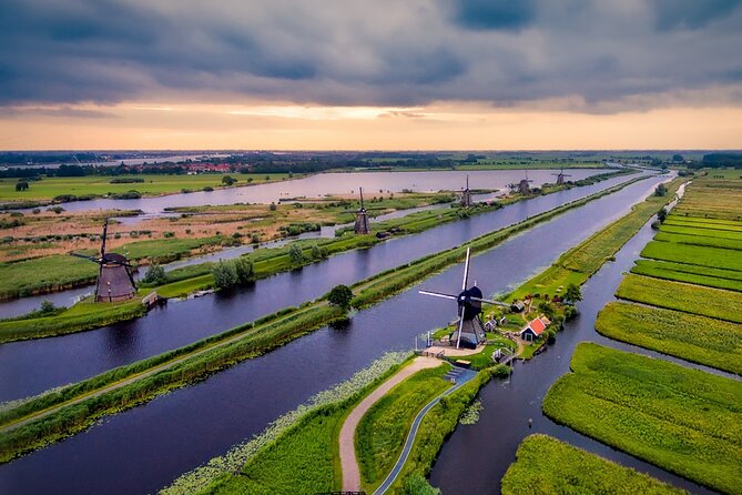 Kinderdijk Windmills and Delft Small-Group Tour from Amsterdam - What the pumping system teaches you