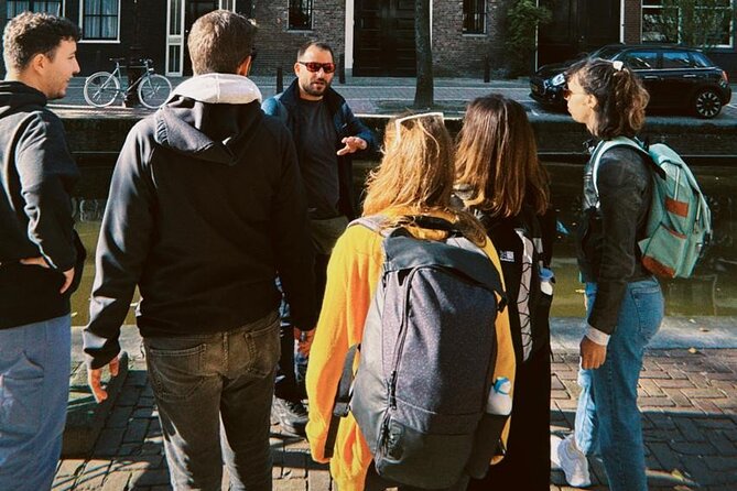 Liberal Amsterdam –Walk the Human Side of the City (small groups) - Dam Square, from market ground to royal setting