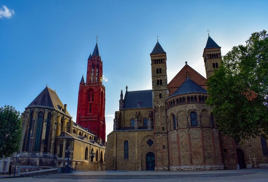 Maastricht: Day trip from Amsterdam with 3 country point - Entering Maastricht through the old city gate
