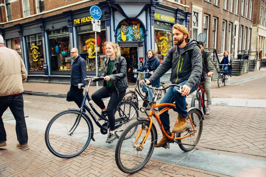 Private Amsterdam Bike Tour with a Local - The oldest house and Blood Graffiti House