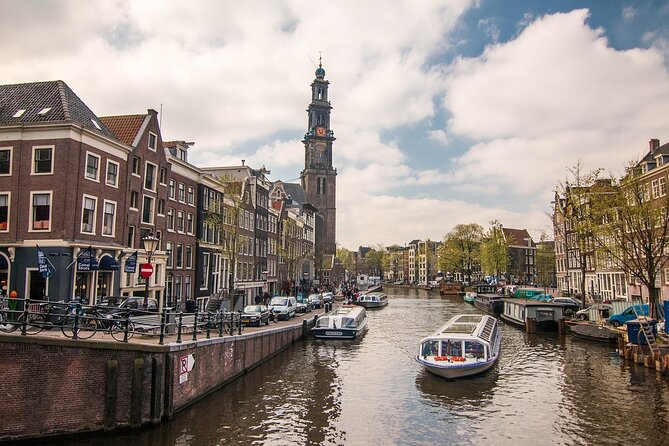 Private Amsterdam City Highlights Bike Tour (PRIVATE GUIDE) - Local stories, history, and practical orientation