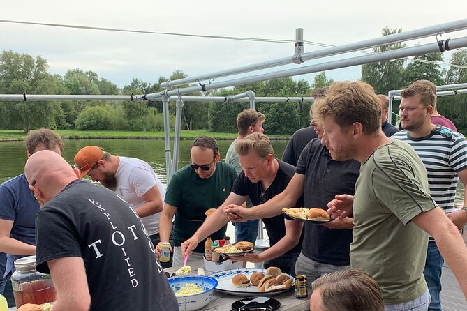Private BBQ Cruise Tour at Lake Paterswoldsemeer With Drinks - Cruising past De Helper windmill