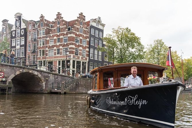 Private boat tour on a electric saloon boat - Why Amsterdam is best seen from a canal