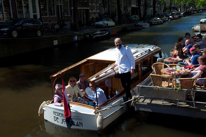 Private Guided Historic Amsterdam Canal Cruise in a Salon Boat - Seeing the Anne Frank House from the canal